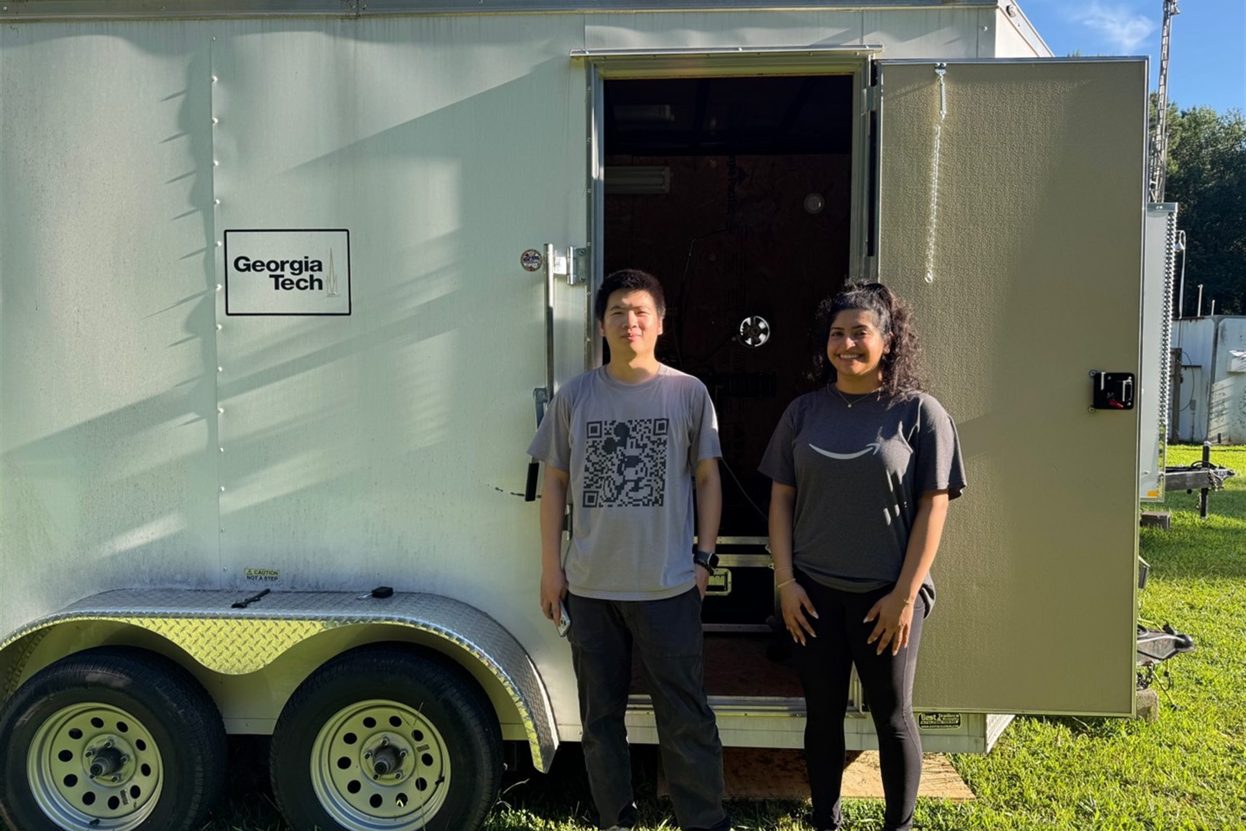 Liu Lab members beside the Georgia Tech mobile laboratory at the South DeKalb monitoring site